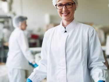 Image of lady preparing food safely for Learn Q The Importance of Food Safety in Food Business Article