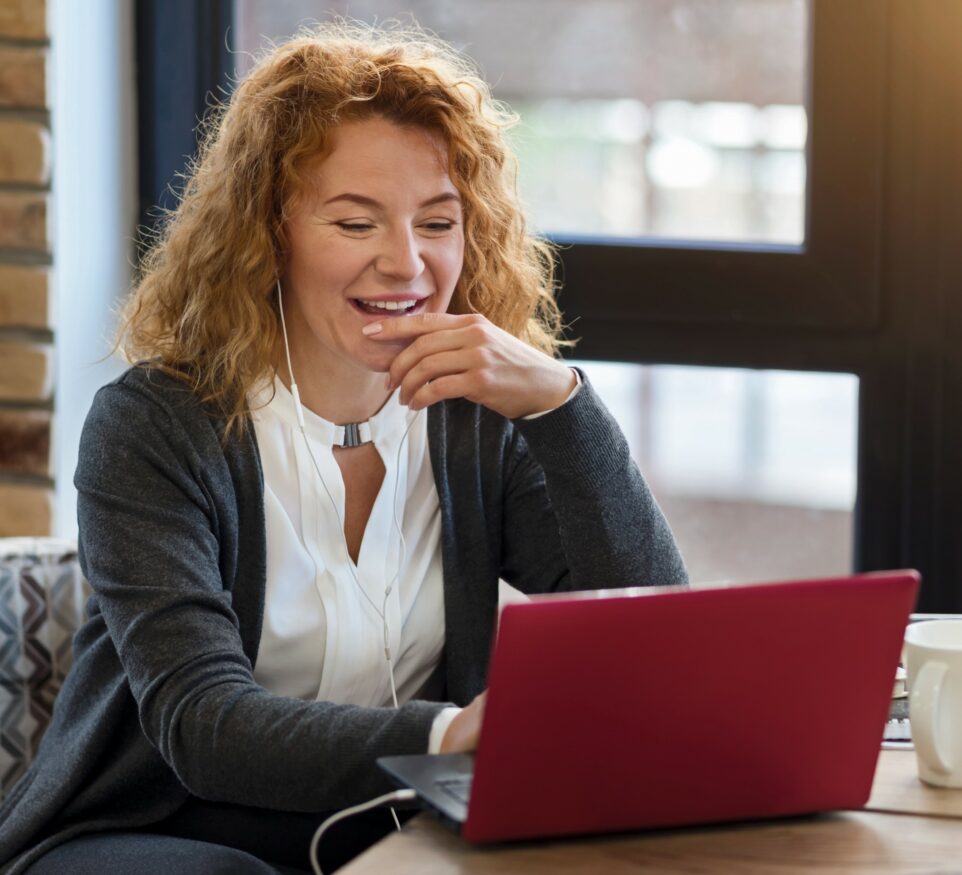 image of lady using laptop for Learn Q Understanding Cyber Security and Risk blog