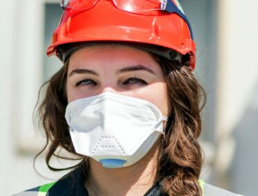 Image of lady in PPE safety equipment for Learn Q Essential Workplace Health and Safety Best Practises blog