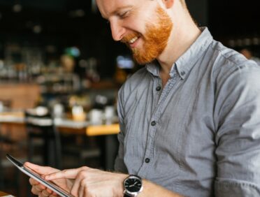 Image of man using tablet for Learn Q Understanding GDPR (General Data Protection Regulation) blog