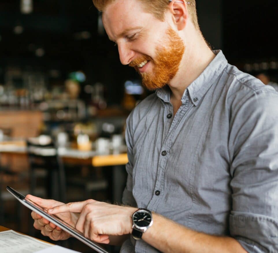 Image of man using tablet for Learn Q Understanding GDPR (General Data Protection Regulation) blog