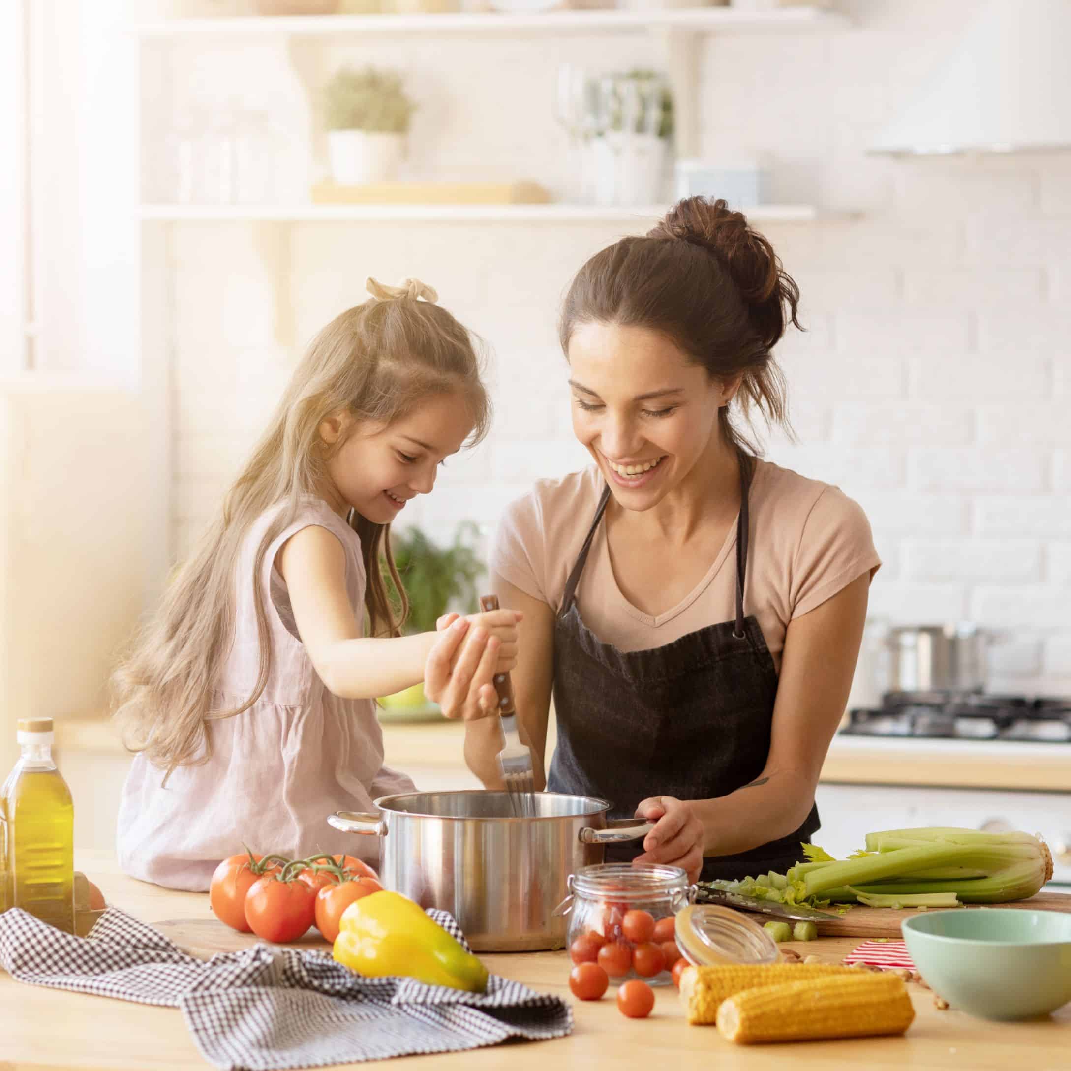 Image of Mother and Daughter Cooking for Learn Q The Hidden Dangers of Fresh Vegetables blog