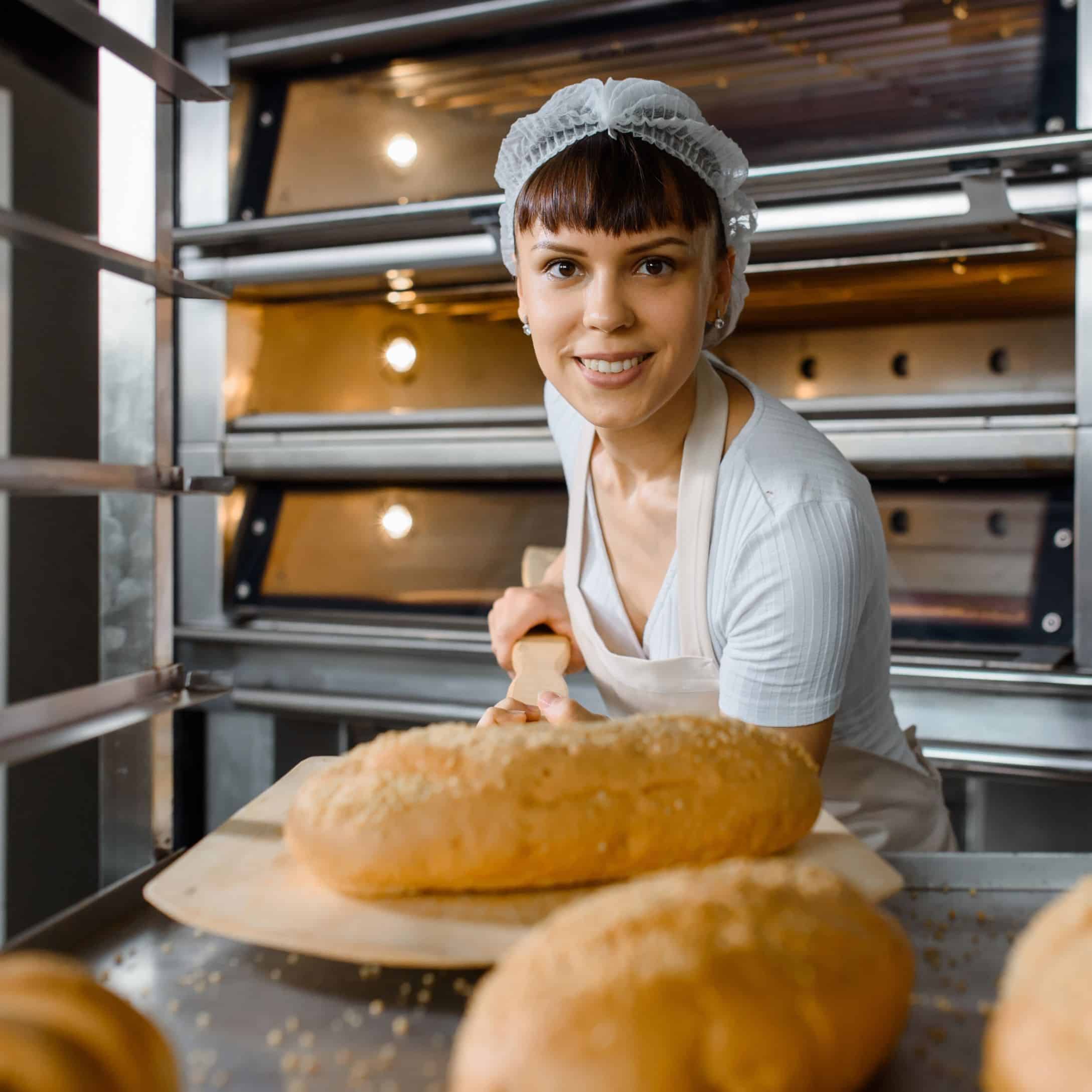 Image of Baker baking a Loaf of Bread for Learn Q Safe Food Handling Best Practices blog