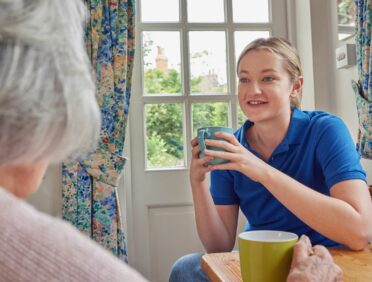 Image of Female Nurse on Home Visit for Learn Q Health and Safety Lone Working blog